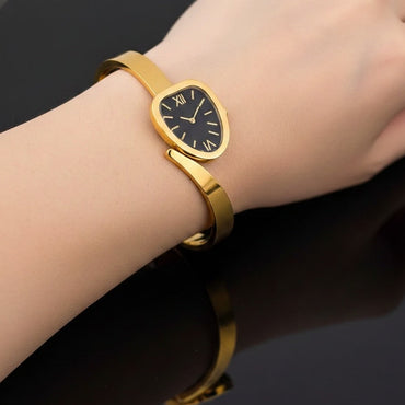 Noir Elegance Gold Wrap Watch – Rs. 800