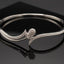 Silver Solstice Wave Bangle - RS 1450