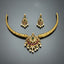Gold necklace with emeralds, rubies, and pearls on a gray background