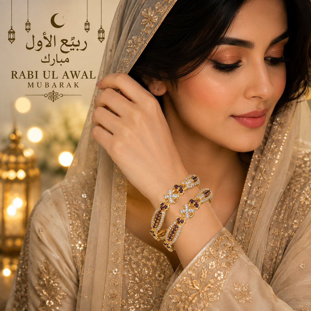 Royal gold-tone bangle with purple stones and sparkling crystal detailing