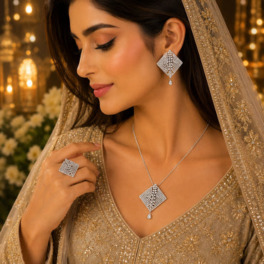 Royal silver-tone geometric crystal necklace set with matching statement earrings