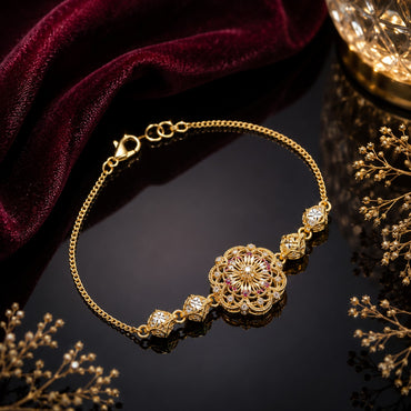 Golden floral medallion bracelet with crystal detailing