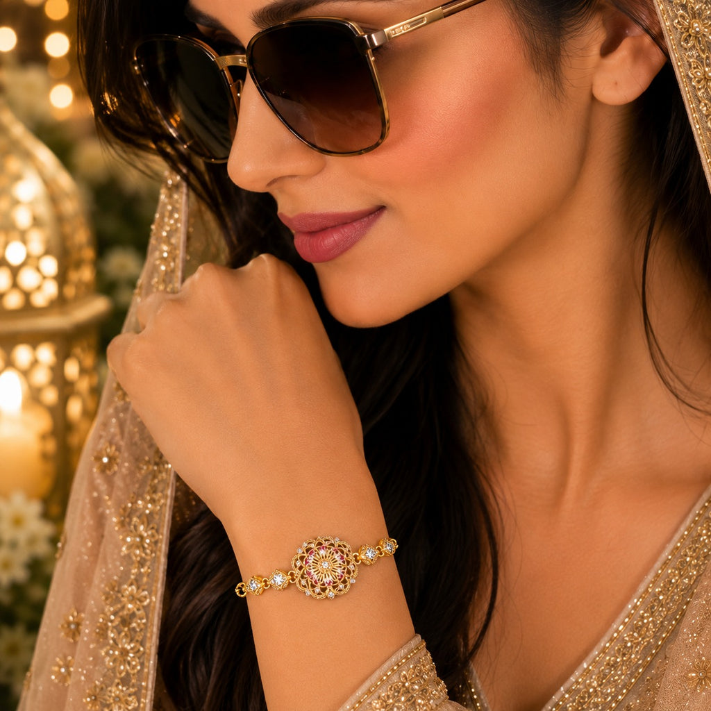 Golden floral medallion bracelet with crystal detailing