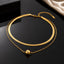 Golden double-layer necklace with textured snake chain, delicate link chain and polished ball pendant