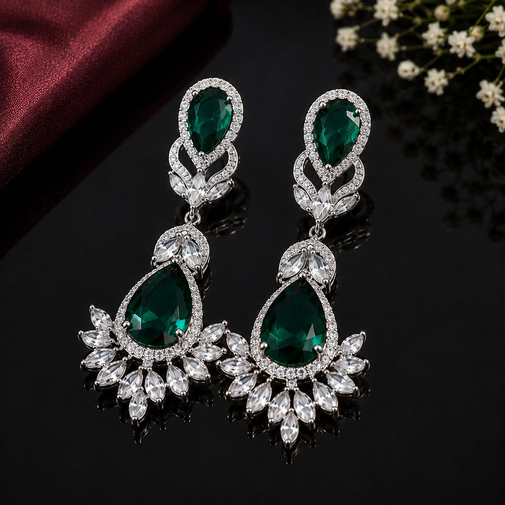 Elegant teardrop American diamond earrings with intricate floral detailing