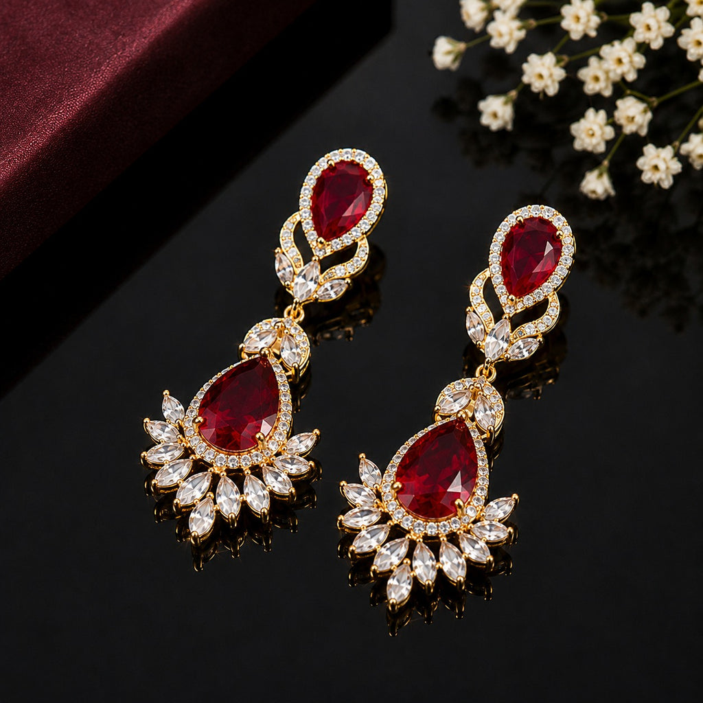 Elegant teardrop American diamond earrings with intricate floral detailing
