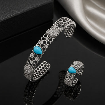 Silver honeycomb bracelet and matching ring with blue stone and CZ detailing