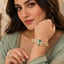 Emerald green CZ bracelet and matching ring with royal floral detailing