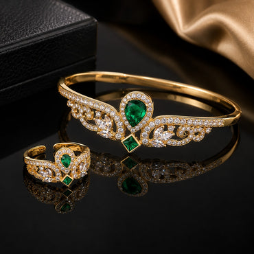 Emerald green CZ bracelet and matching ring with royal floral detailing
