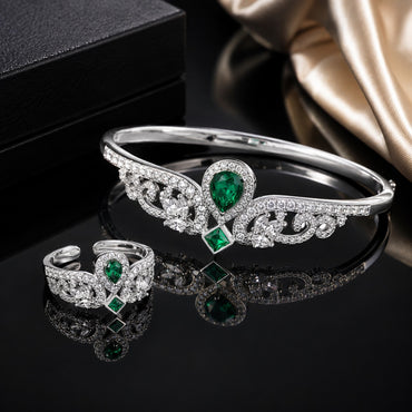 Emerald green CZ bracelet and matching ring with royal floral detailing