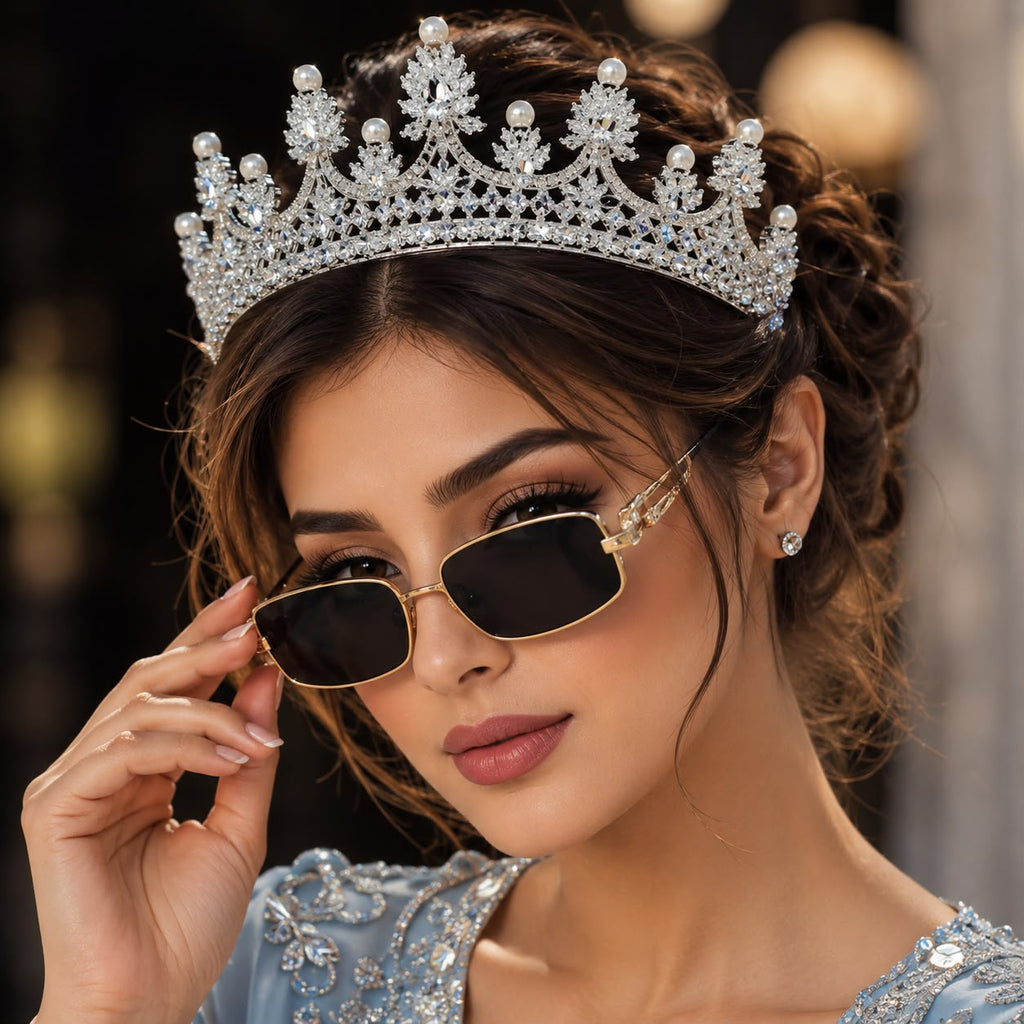 Elegant silver crystal pearl royal tiara bridal crown with sparkling stones and pearl detailing