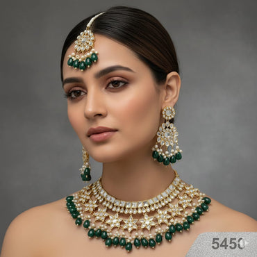 Gold Plated Kundan Jewelry Set with Red Beads – Rs. 5450