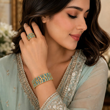 Golden CZ designer bracelet and matching ring set with intricate detailing
