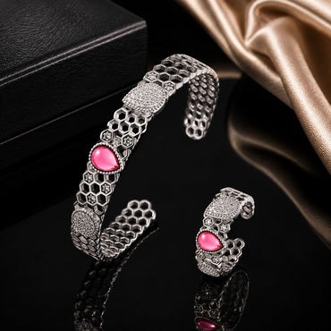 Silver honeycomb bracelet and matching ring with blue stone and CZ detailing