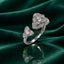 Silver CZ Lotus Bloom & Trefoil Open Cuff Bridal Cocktail Ring on dark green velvet drape surface with mirror reflection backdrop
