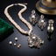 Antique Silver-Tone Multicolor CZ Pavé Baroque Floral Lotus Pendant on Multi-Strand Twisted Seed Pearl & Rose Bead Long Necklace & Stud Earrings Set on black mirror surface with loose freshwater pearls, green velvet pouch and antique silver perfume bottle backdrop