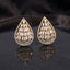 Baguette CZ Teardrop Stud Earrings with Round Pavé Border in silver-tone plating worn on model ear with beige silk curtain backdrop and silver grey blazer showing tiered baguette CZ teardrop with pavé round CZ border