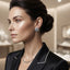 Model wearing rounded-square black and clear-looking striped stud earrings with a silver-tone appearance.