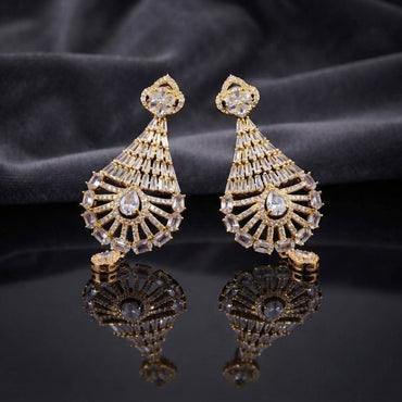 CZ Baguette Fan and Multicolour Sunburst Peacock Drop Earrings in Gold White Diamond on dark mirror surface with charcoal satin backdrop showing 22K gold-tone pair with baguette CZ cone fan open sunburst peacock spoke fan with all-white clear oval CZ accents and white pear CZ halo drop with mirror reflection