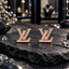 Pair of gold-tone interlocking LV-letter earrings with smooth pink L-shaped details and clear sparkling V-shaped sections.