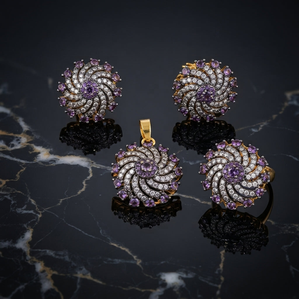 Gold-Tone Amethyst Purple & White CZ Pinwheel Swirl 3-Piece Jewelry Set — pendant, earrings and ring on black marble surface