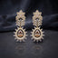 Gold Champagne CZ Lotus Crown and Pear Halo Sunburst Marquise Drop Earrings on dark mirror surface with charcoal backdrop showing 22K warm gold-tone grand drop earring pair with large lotus crown marquise white CZ petals open feather palm frond micro-pave champagne CZ connector and grand champagne morganite pear CZ halo pendant with double-row halo and outer marquise white CZ sunburst fringe