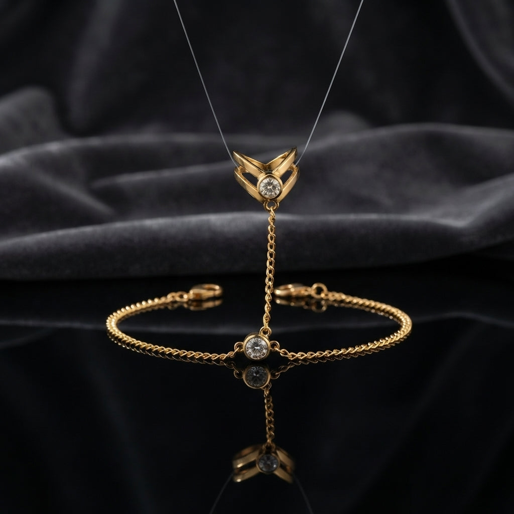 Gold CZ Bezel Double Chevron Arrow Ring Slave Hand Chain Bracelet luxury product flat-lay displayed on transparent stand showing double chevron ring at top and bezel CZ bracelet below on dark charcoal silk backdrop