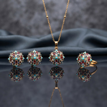 Gold CZ Cluster Dome 3-Piece Jewelry Set in Emerald Green showing pendant necklace on gold cable chain stud earrings and adjustable ring all with fully domed emerald green faceted CZ stone cluster in gold-tone prong setting on dark mirror surface with dark silk backdrop
