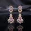 Gold CZ Double Teardrop Marquise Fan Chandelier Earrings in Crystal Clear pair on dark mirror surface with grey silk backdrop showing 18K gold-tone small crystal clear pear CZ stud with white CZ pave halo infinity connector and large crystal clear pear CZ drop with white CZ pave halo and marquise CZ fan crown with mirror reflection below