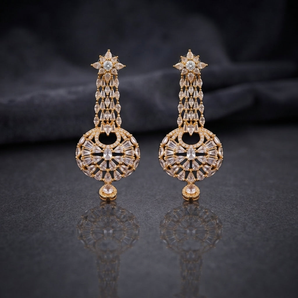 Gold CZ Star and Marquise Cascade Waterfall Sunburst Ball Globe Drop Earrings on dark slate surface with charcoal satin backdrop showing 22K gold-tone full length pair with 8-pointed marquise CZ star stud triple-strand cascade waterfall stem open-work sunburst ball globe and champagne CZ cabochon drop from alternate angle