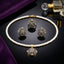 Gold-Tone 3D Dome Ball Pavé Black & White CZ Pearl Chain Necklace, Earrings & Ring Jewelry Set on black reflective surface with purple velvet fabric and crystal perfume bottle backdrop