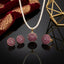 Gold-Tone 3D Dome Ball Pavé Ruby Red CZ Pearl Chain Necklace, Earrings & Ring Jewelry Set on black reflective surface with crimson velvet brocade fabric and gold geometric frame backdrop