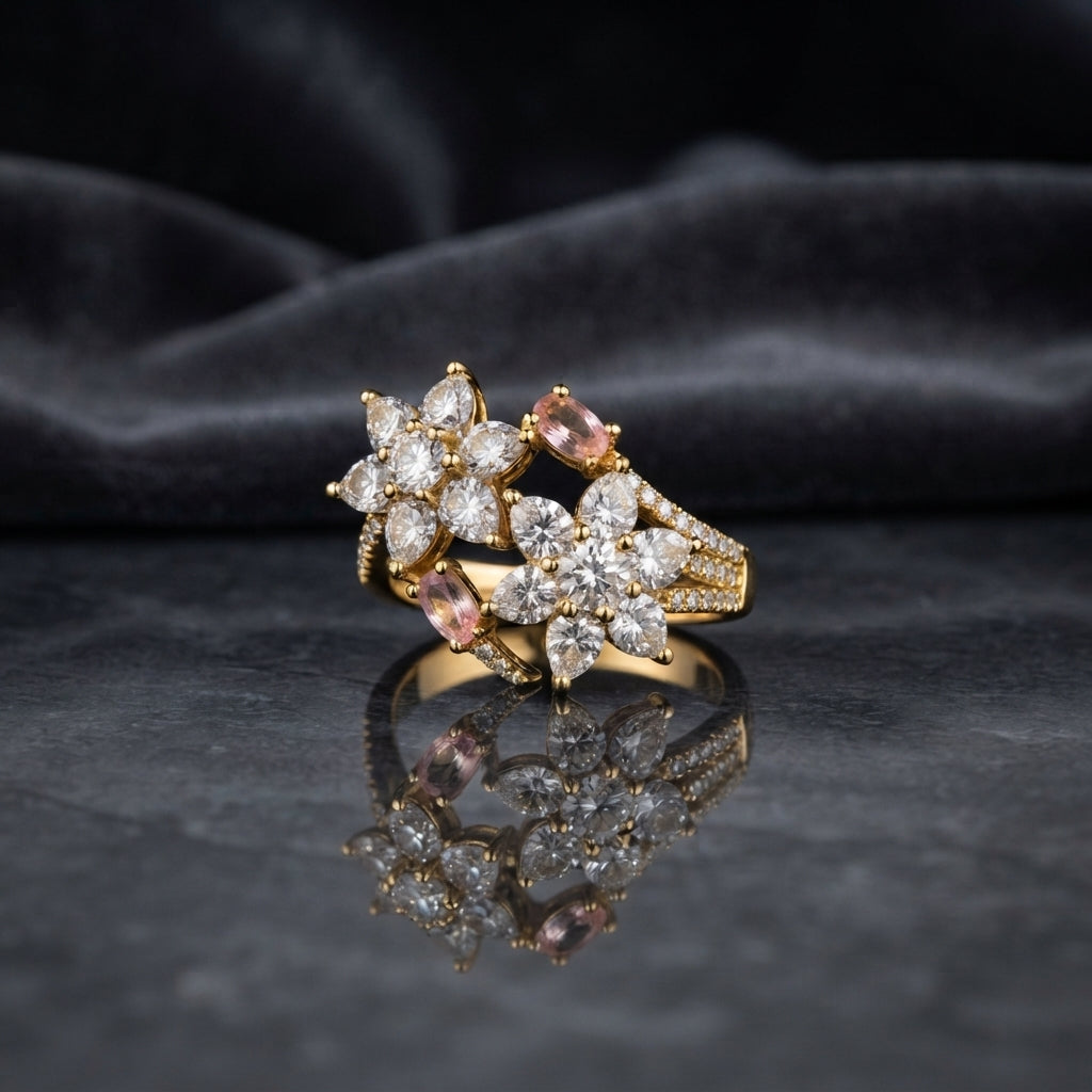 Gold Double Flower Cluster CZ Cocktail Ring in blush pink morganite CZ accent variant — luxury flat-lay on mirror surface with charcoal silk backdrop