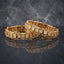 Gold Filigree Square Stone Seed Pearl Bangles Bridal Pair in 18K antique gold-tone plating on dark grey mirror surface with marble backdrop showing two rigid bangles with alternating square white ivory stone tiles in gold box-bezel settings and ornate gold filigree scroll medallions with seed pearl bead top and bottom edges and mirror reflection below