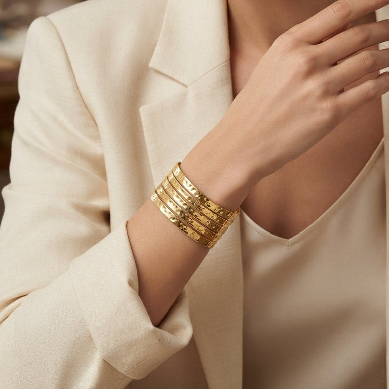 Gold-Tone Hammered Texture 5-Row Open Slot Cuff Wide Statement Bracelet worn on model wrist with cream blazer in editorial setting