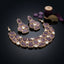 Gold-Tone Hand-Carved Amethyst Purple Polki & Rose-Cut CZ Kundan Wide Choker Necklace & Drop Earrings Bridal Set on black mirror surface with carved amethyst stones, gold fan and purple velvet ribbon backdrop