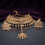 Gold Kundan Polki and Pearl Choker Earrings and Maang Tikka Bridal Set on dark mirror surface with purple velvet backdrop showing antique gold-tone choker with pear polki rows floral rosette pearl fringe chandbali earrings and floral disc maang tikka