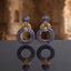 Gold Leaf CZ Pavé Circle Drop Earrings in Emerald Green color in 18K gold-tone plating on grey mirror surface with Mughal archway backdrop showing round dome ball stud top and large open circle drop fully covered in dense emerald green micro-pavé CZ stones with gold leaf connector and mirror reflection below