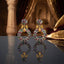 Gold Leaf CZ Pavé Circle Drop Earrings in Ruby Pink color in 18K gold-tone plating on dark mirror surface with warm Mughal palace backdrop showing round dome ball stud top and large open circle drop fully covered in dense ruby pink micro-pavé CZ stones with gold leaf connector and mirror reflection below