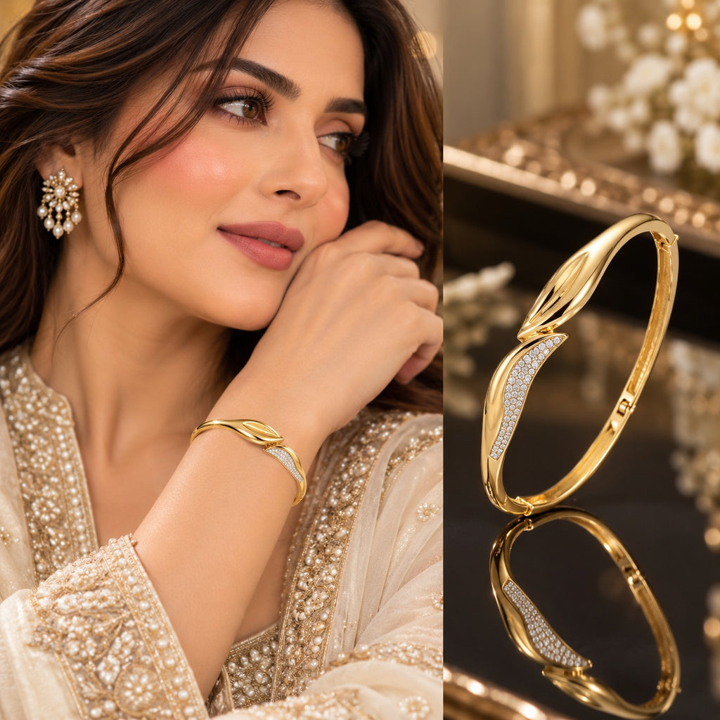Gold Leaf Pave CZ Wave Rigid Bangle collage showing lifestyle shot of model in ivory formal embroidered suit wearing gold bangle on wrist and product flat lay on dark mirror surface with gold decor backdrop showing asymmetric curved micro-pave white CZ wave panel with polished gold leaf overlay and hinge clasp
