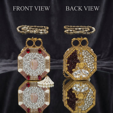 Gold Mughal Minaudère Octagonal Mirror Pearl Ruby Clutch Bag with Pearl Chain — front and back view composite showing handcrafted antique gold octagonal metal clutch with shisha mirror-work tile front face, ruby oval cabochon corners, blush MOP center medallion with kundan leaf petals, pearl tassel fringe, burgundy bead embroidery back face with kundan leaf motif, double ring hinged clasp, and long pearl-station gold chain, on dark charcoal silk backdrop with mirror reflection