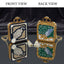 Gold Mughal Minaudère Rectangular Navy Peacock CZ Pearl Emerald Leaf Clutch Bag — front: navy blue crystal border, ivory kundan field, white CZ peacock motif, carved MOP flower; back: emerald green leaf petal field, blue agate oval, gold zardozi vine, pearl tassel; dark silk backdrop with mirror reflection