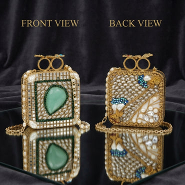 Gold Mughal Minaudère Square Mirror Kundan Emerald Pear Clutch Bag — front view: shisha mirror-work tiles, pearl border, emerald bead inner frame, large jade pear cabochon center in kundan leaf surround; back view: kundan navette scale mosaic, teal bead diagonal, butterfly motif, MOP fan, crystal drops; dark silk backdrop