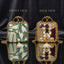 Gold Mughal Minaudère Square Teal Bead MOP Feather Green Onyx Baroque Pearl Clutch — front: iridescent teal AB bead field, white MOP carved feathers, baroque pearls, green onyx slab center; back: gold zardozi net lattice, ruby bead panel, navy cabochon, MOP flower, baroque pearls; dark silk backdrop
