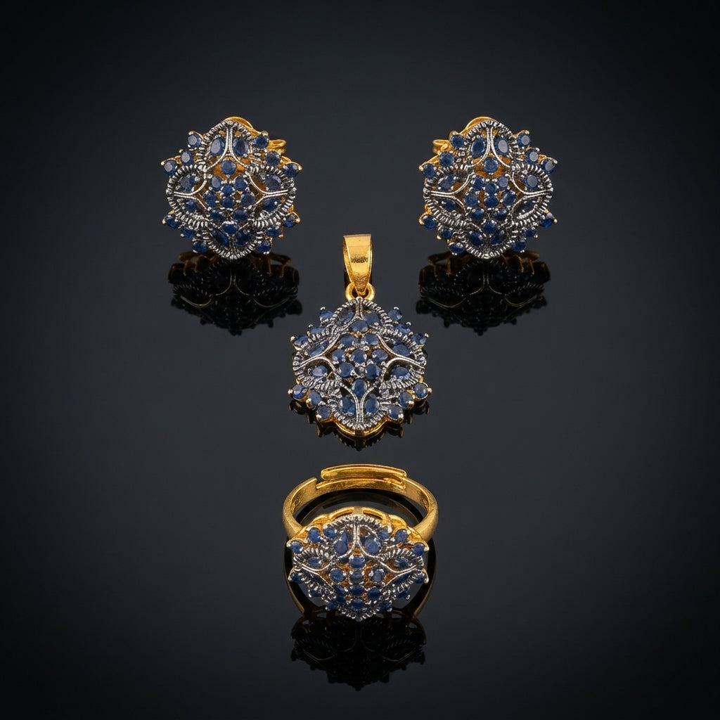 Gold & Oxidized Silver-Tone Blue Sapphire CZ Floral Cluster 3-Piece Jewelry Set — pendant, earrings and ring on dark reflective surface