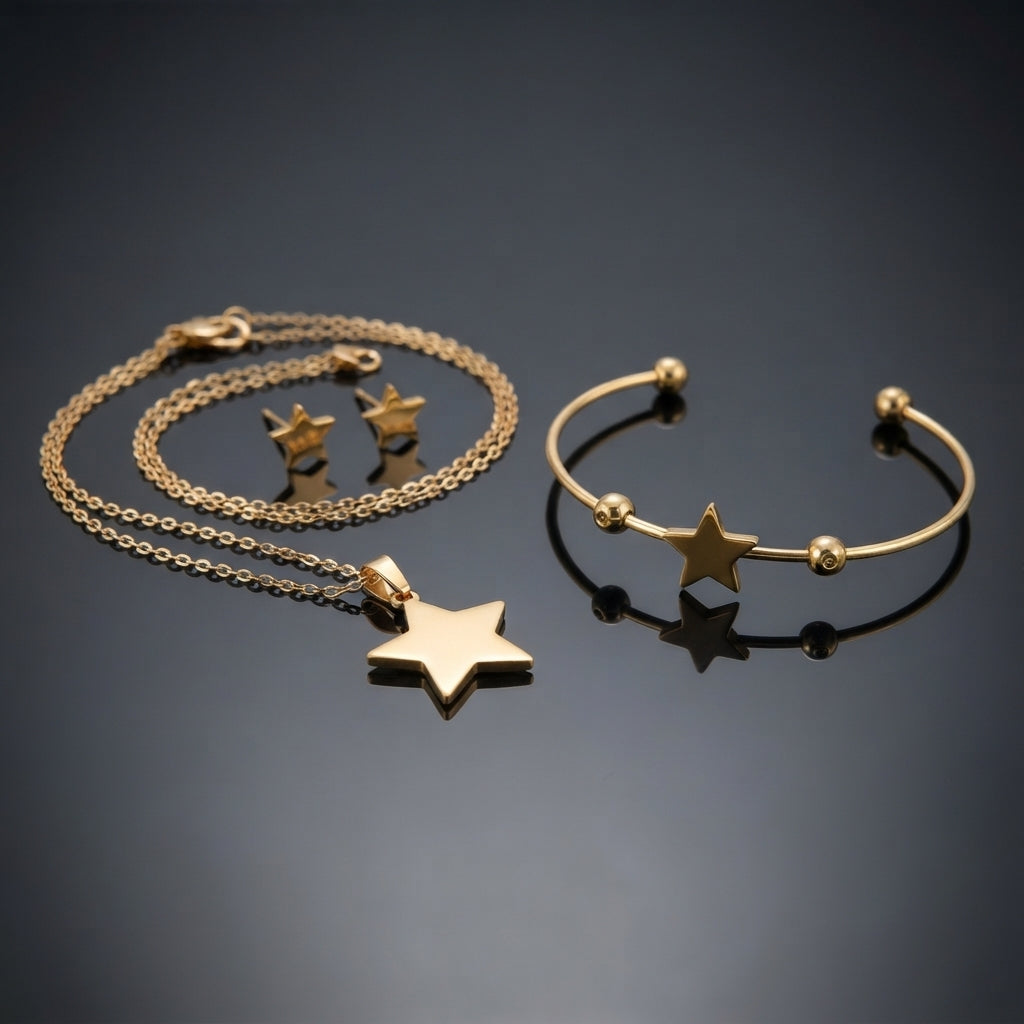 Gold Polished Star Pendant Necklace Cuff Bangle Earrings Set — 3-piece all-gold minimalist set of fine cable chain with large polished 5-point star pendant, open ball-end cuff bangle with center star and bead accents, and matching small gold star stud earrings, luxury flat-lay on dark mirror surface with charcoal silk backdrop