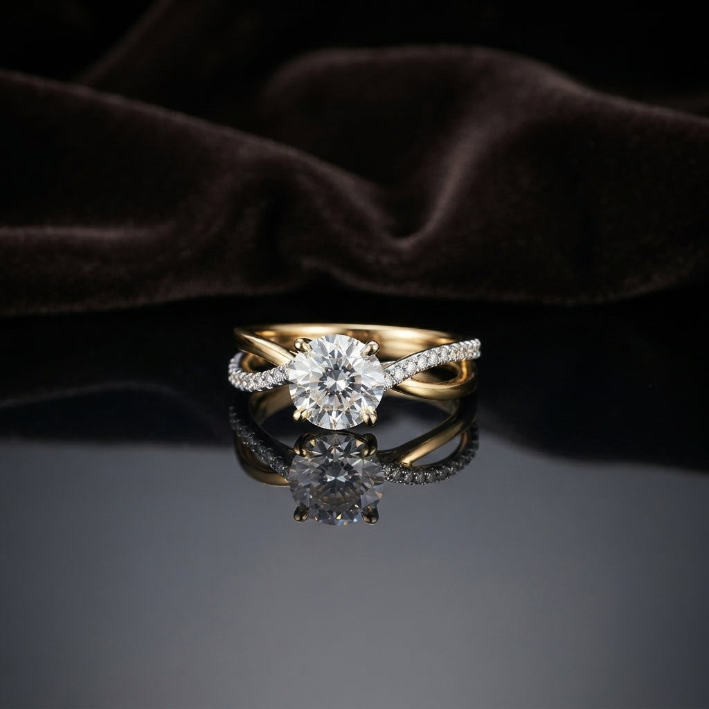 Gold Round CZ Solitaire Infinity Twist Crossover Bridal Engagement Ring on dark grey mirror surface with dark brown velvet drape backdrop