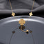 Gold Textured Four-Leaf Clover Multi-Charm Station Necklace