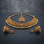 Gold-Tone Antique Rajwari Ruby & Pearl Choker Necklace, Jhumka Earrings & Maang Tikka Set flat lay