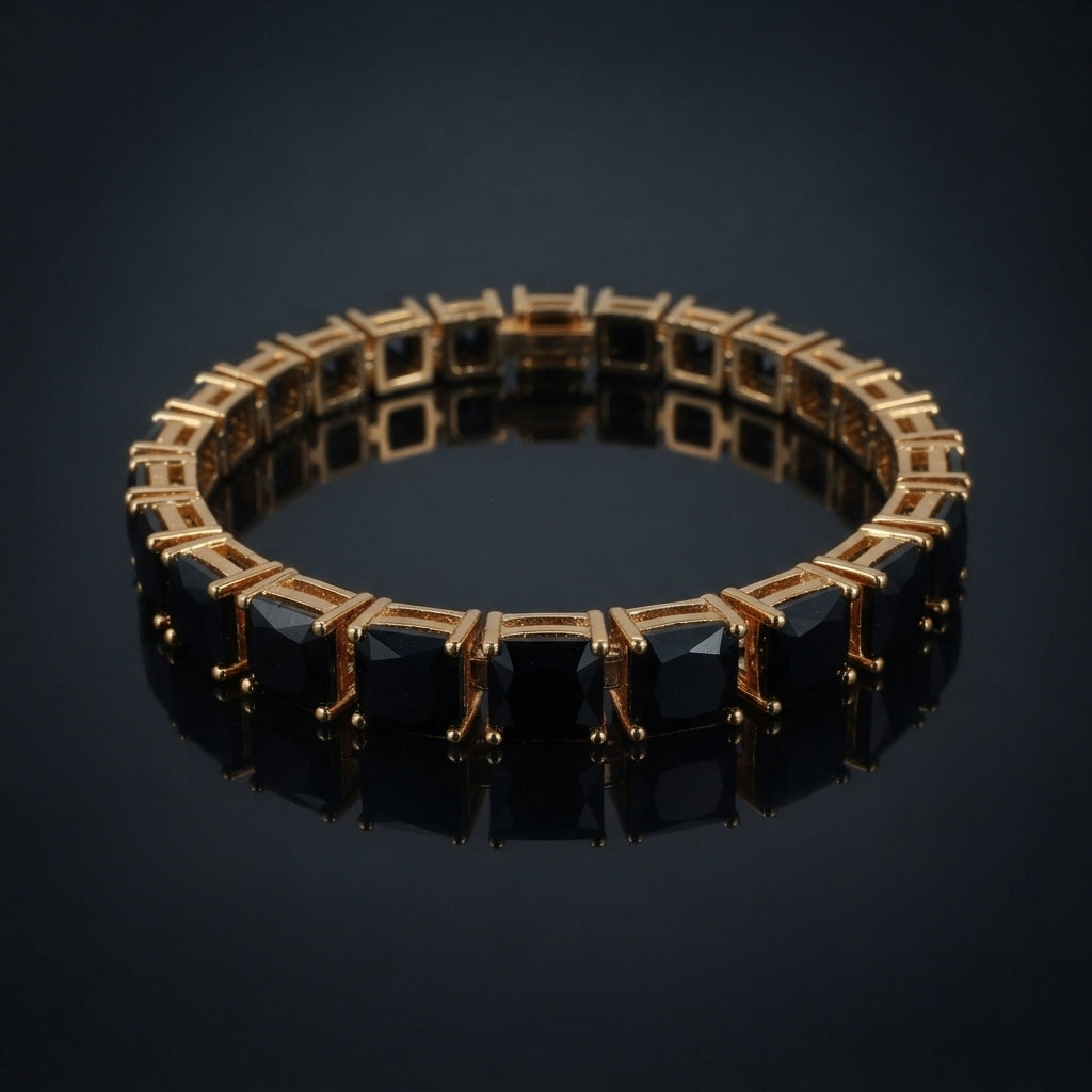Gold-Tone Black Princess-Cut CZ Tennis Bracelet product shot on dark surface